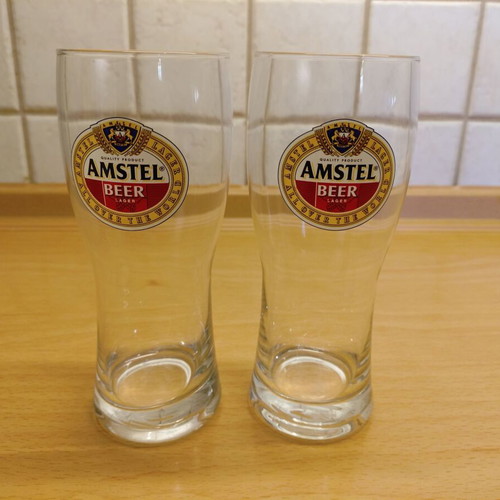 Amstel beer glasses like new, set of 2