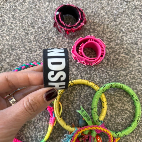 Children's jewelry used, colorful bracelets and pendants