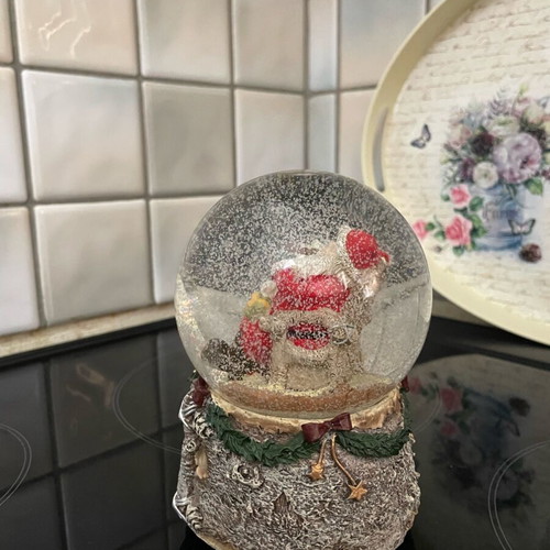 Christmas snow globe with Santa like new