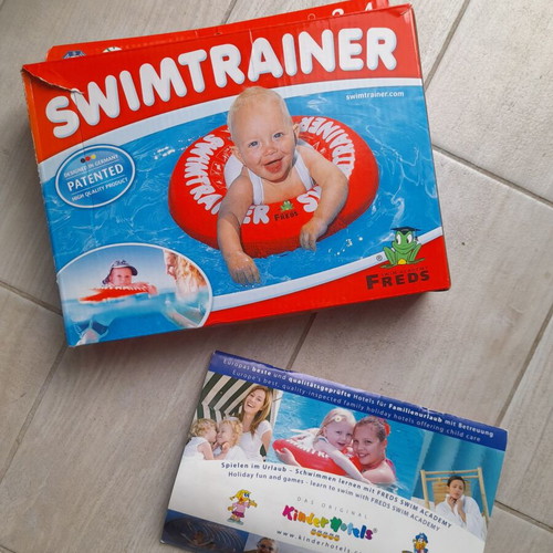 SwimTrainer Red flotation device like new, for 0-4 years