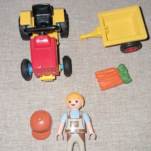 Playmobil small farmer figure with tractor like new