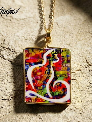 Psychedelic Gatto necklace new with abstract cat design