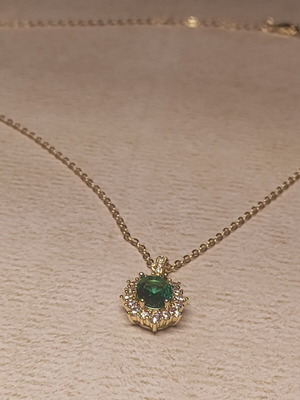 Women's necklace with green gemstone pendant