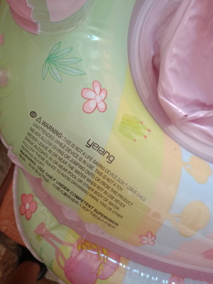 Baby float ring like new with built-in seat and steering wheel toy