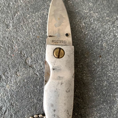 Small knife used, missing screw