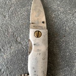 Small knife used, missing screw