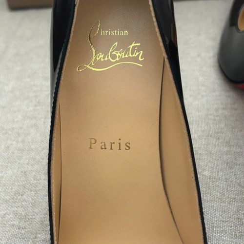 Christian Louboutin black patent leather pumps used