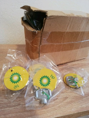 BP Bleed Keys Keychains like new, box with about 100 pieces