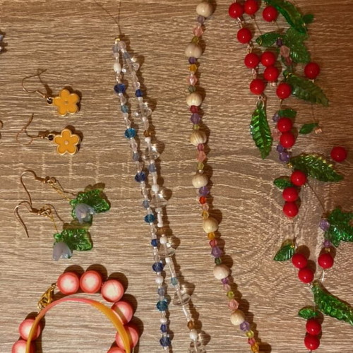 Set of various jewelry and decorative items like new, colorful