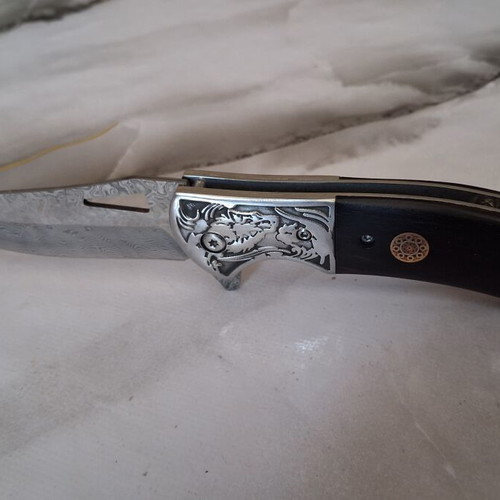Folding knife from Damascus steel new