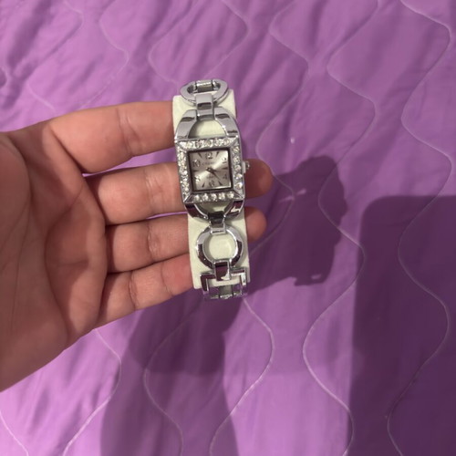 Watch, ring, and earrings set like new, gray