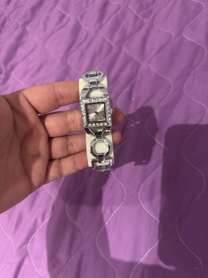 Watch, ring, and earrings set like new, gray