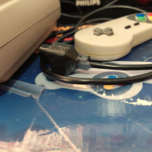 Retro game console used, complete with cartridge and controller