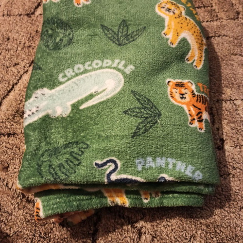 Fleece blanket like new with jungle theme for toddlers