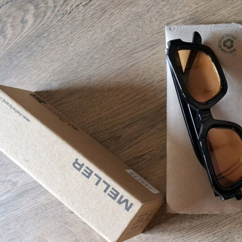Meller sunglasses like new with yellow lens and black frame