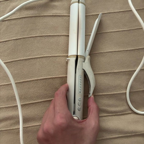 Izzy hair straightener and curler used