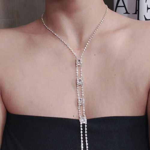 Evening jewelry set necklace-lariat and earrings with strass, new, silver-tone
