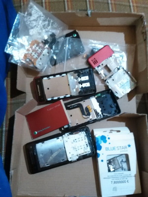 Sony Ericsson C902 parts used, package with two keypads