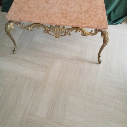 Bronze coffee table used with pink marble