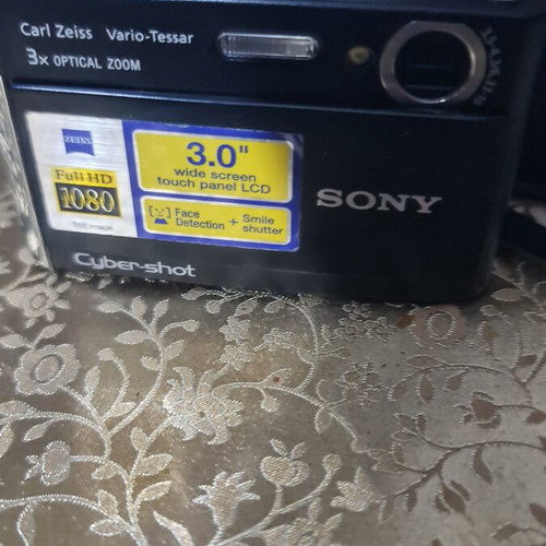 Sony Cyber-shot TSC-T70 camera with battery and accessories
