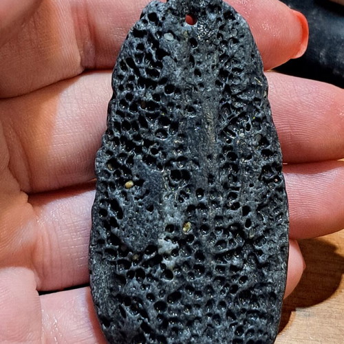 Natural raw stones like new, oval terracotta and textured gray