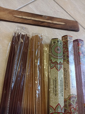 Aromatic incense sticks with wooden base, assorted scents