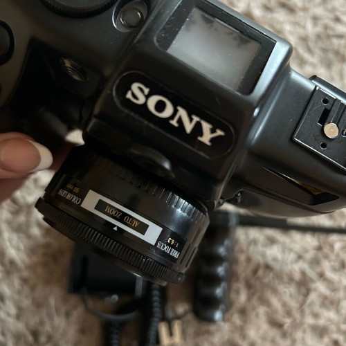 Sony camera like new with handle, flash, and bag