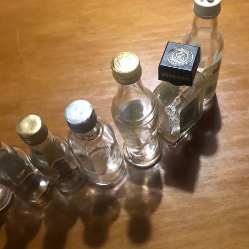 Glass miniature bottles used, pack of 7, vintage spirit collection