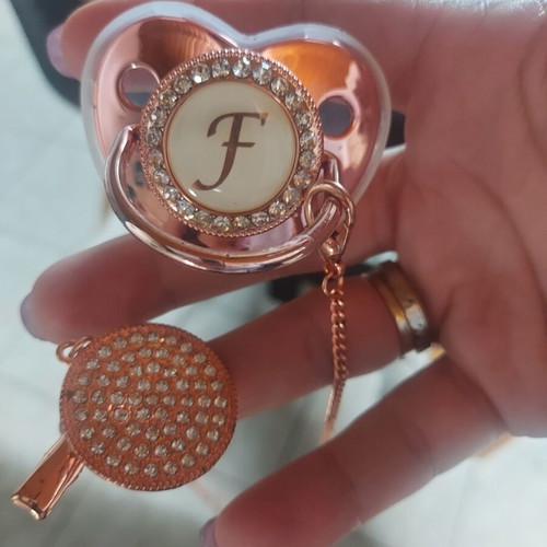 Pacifier with rhinestones and clip in pink gold new