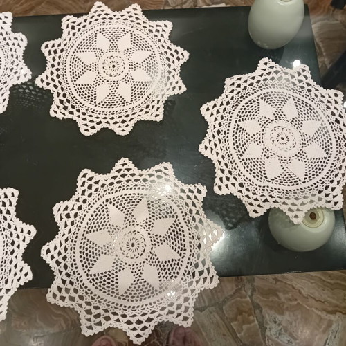 Handmade crochet doilies set of 9, star flower motif, 1965