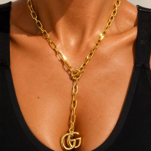 Gucci gold necklace with large GG pendant and chain, new