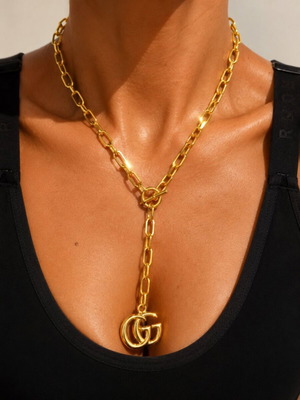 Gucci gold necklace with large GG pendant and chain, new