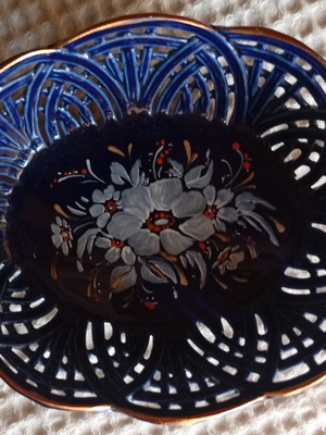 Handmade cobalt blue reticulated porcelain decorative bowl with floral painting