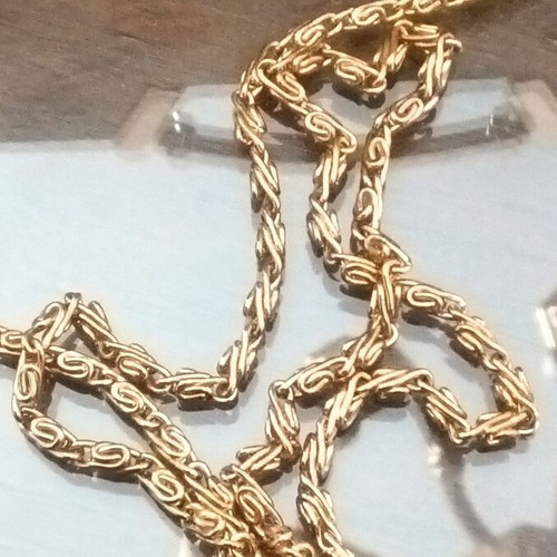 Small gold handbag with handle and long chain, like new