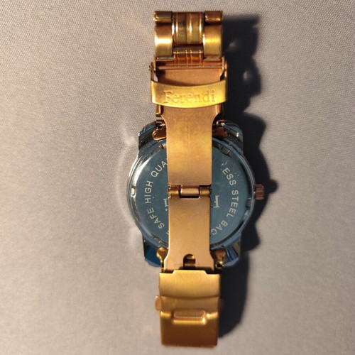 Ferendi F3998 women's watch like new, gold color