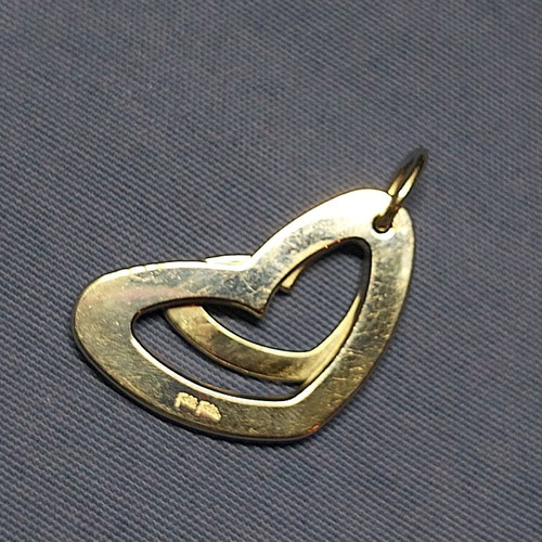 Jewelry used, metal heart Folli Follie, not silver