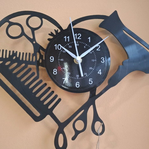Wall clock made of vinyl new, silent operation 25x30 cm