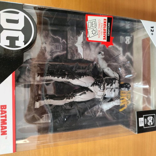 Batman figure new with sealed comic