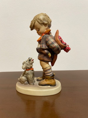 Hummel Goebel vintage porcelain figurine of child with dog and flowers