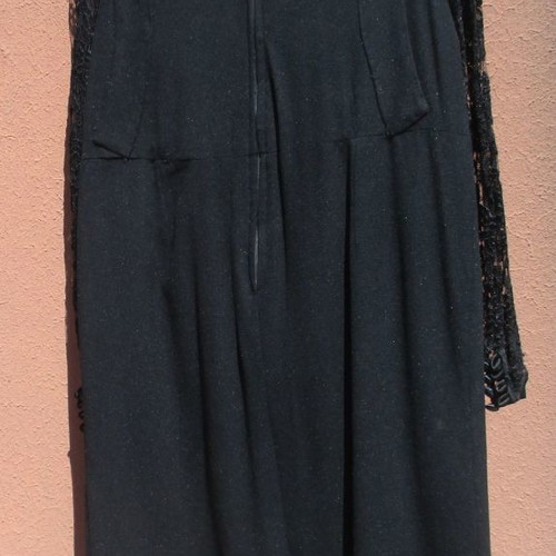 Vintage women's dress used from the 1960s with lace sleeves black