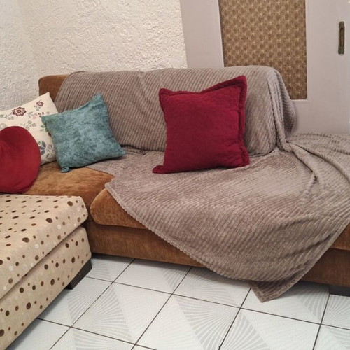 Corner sofa with two-seater and recliner