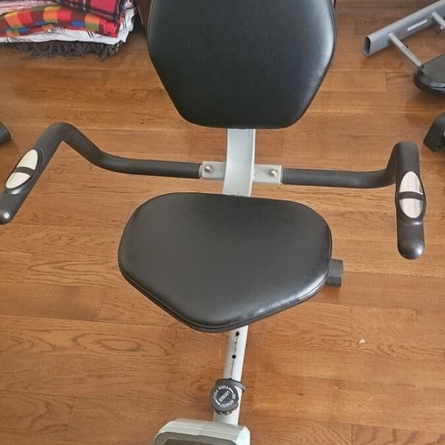 X-Fit stationary bike used with time and calorie counter