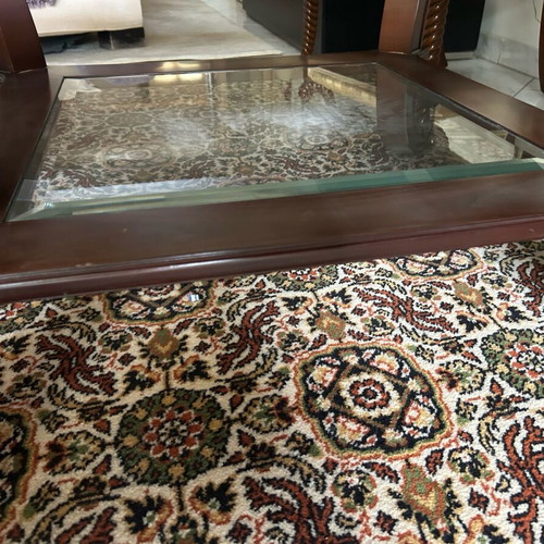 Coffee table like new walnut wood with brass lion legs and glass top