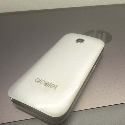 Alcatel mobile phone, silver, memory card slot