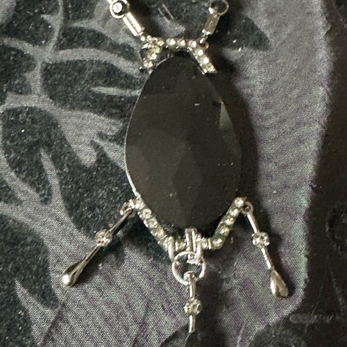 Black steel necklace like new with stone and gems