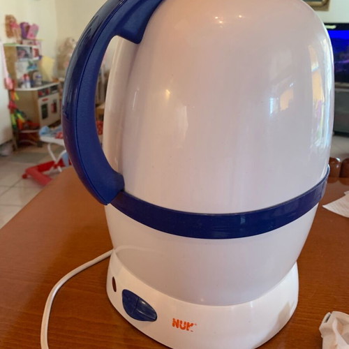 Nuk bottle and pacifier sterilizer used