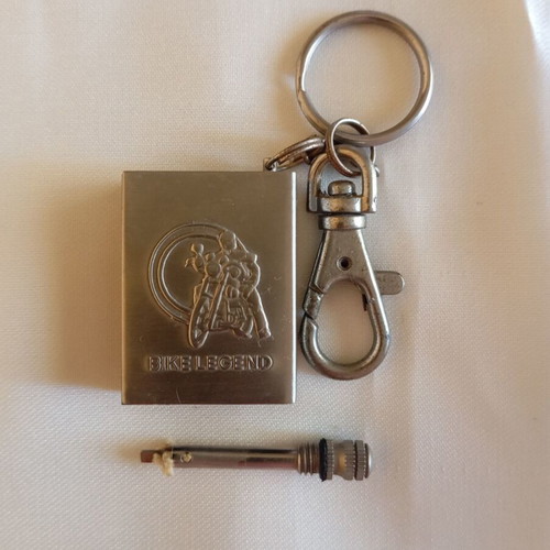 Vintage biker legend keychain lighter like new, nickel color