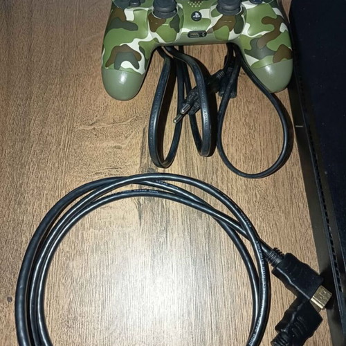 PS4 Slim 1TB console with original controller and cables