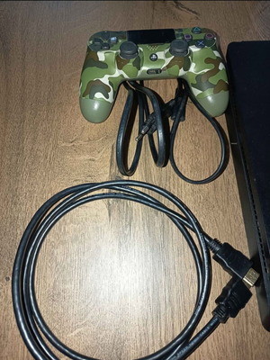 PS4 Slim 1TB console with original controller and cables