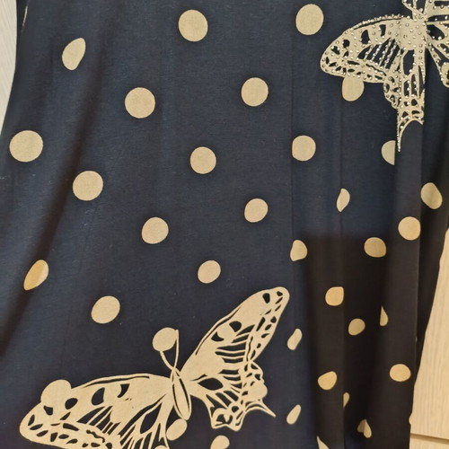 Black oversized t-shirt with gold/beige polka dots and butterflies like new